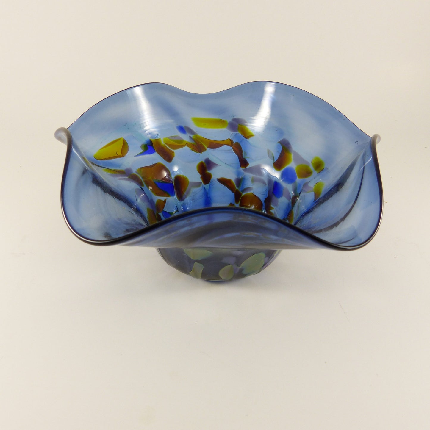 Blue glass wavy edge bowl vase